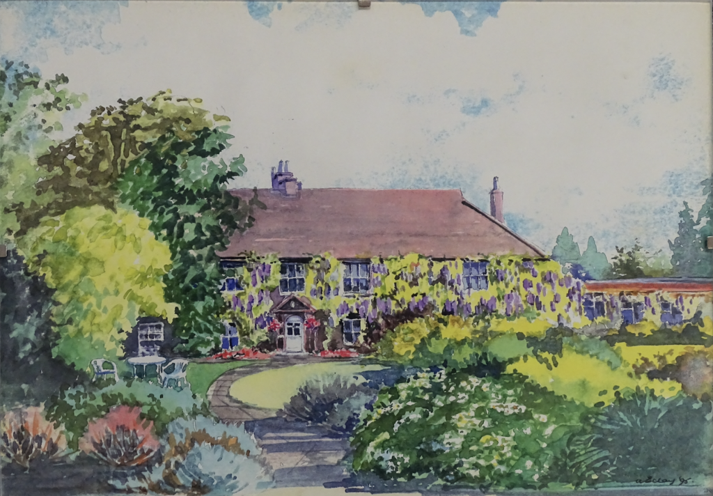 Watercolour painting of Manor Farm. Frontal view of brown cottage decorated with green, pink and purple flora. There is a path leading from the froreground to front door of building. Bushes and trees in different tones of green on both sides of the building